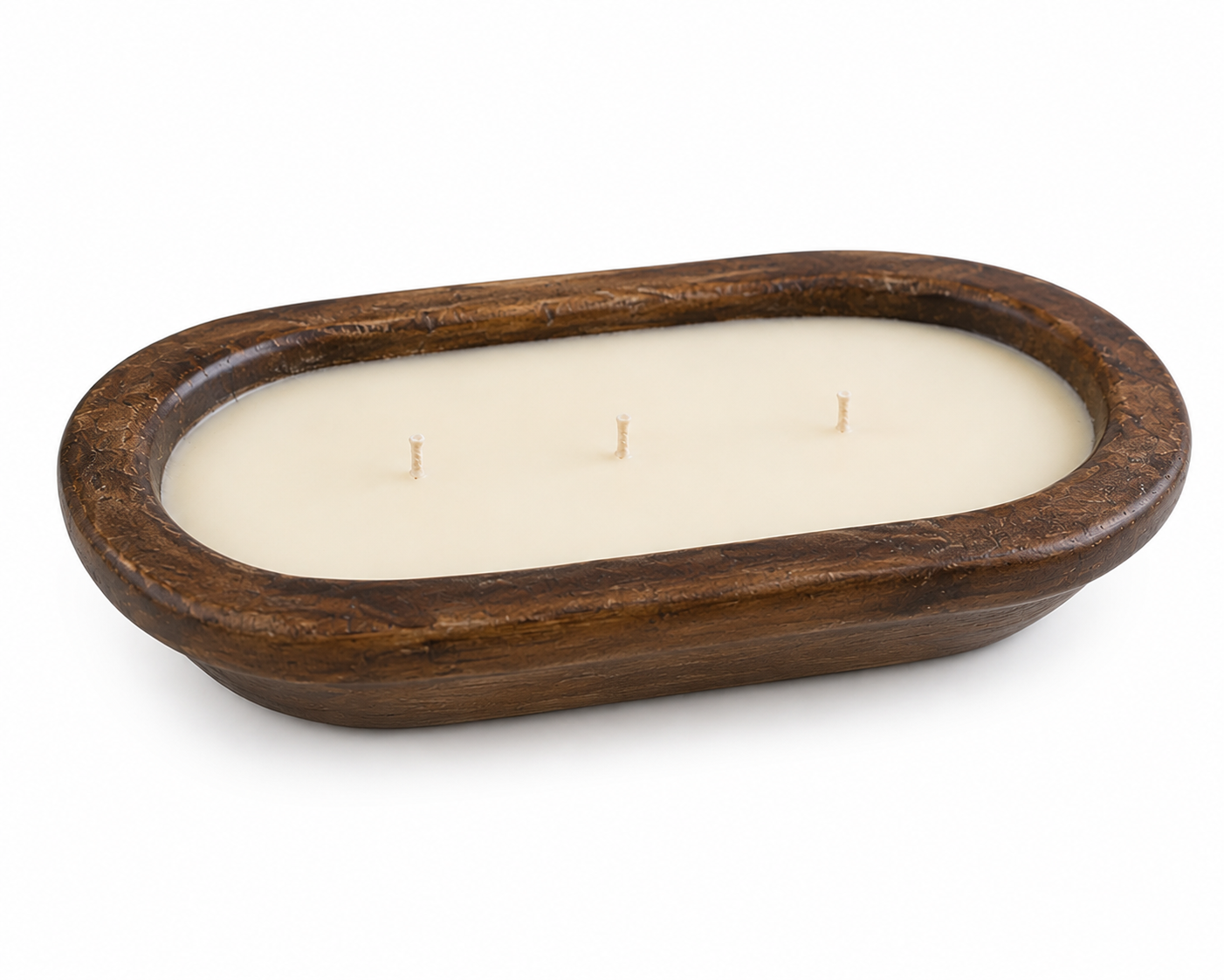A three-wick soy wax candle in a dark brown wooden oval tray, photographed on a clean white background.