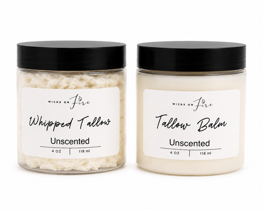 Two clear plastic jars of Wicks on Fire Unscented body balm with black lids and white labels, shown side by side on a white background.